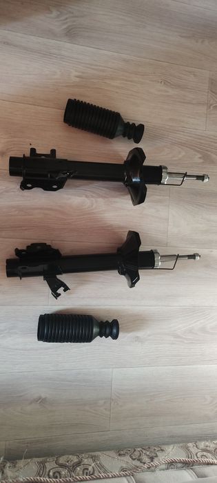 Продам задние стойки Ниссан примера п 10 новые