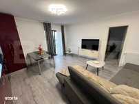 Apartament cu 2 camere– amenajat cu stil si pat baldachin in dormito