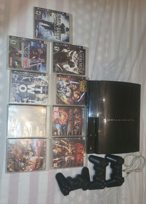 PlayStation 3 В комплекте: 15-20 игр, З джойстика и зарядка