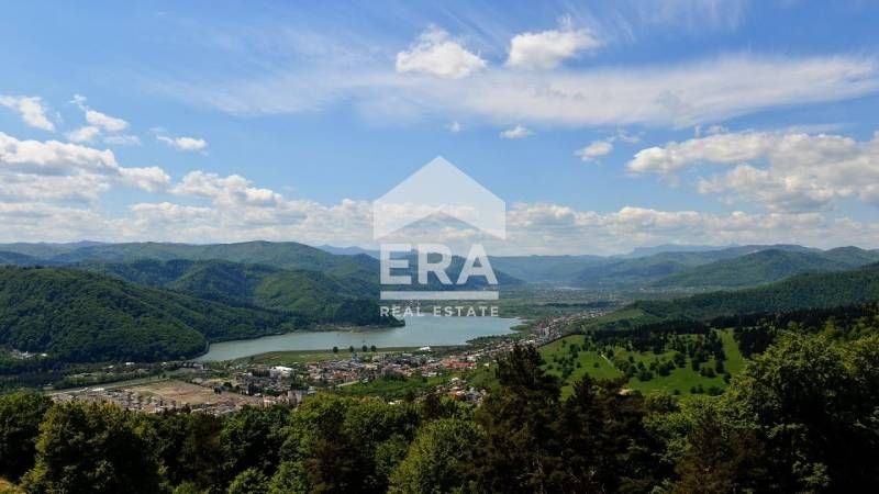 Парцел близо до язовир Доспат-  природа, чист въздух и гледка към Родо