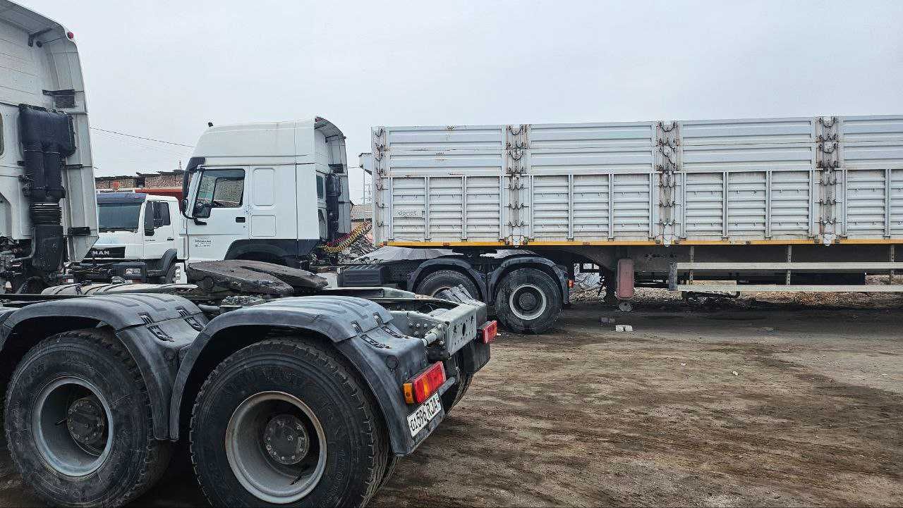 тягач дизельный HOWO A6 c прицепом