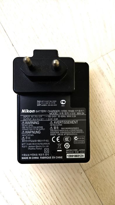 Nikon D3200l SLR camera with an 18-55mm VR lens.