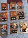Vand 54 de cartonașe Pokemon originale+ pachetul lor, înveliș de aur