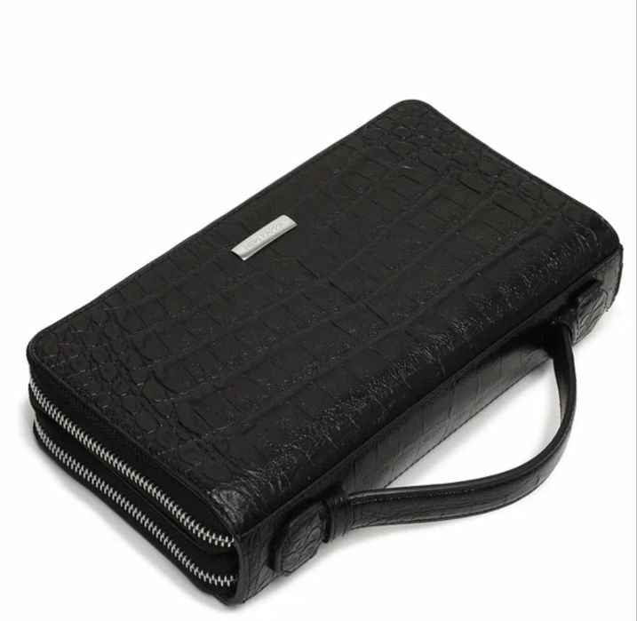 Барсетка от бренда NERI KARRA