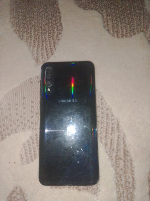 Телефон сатылады