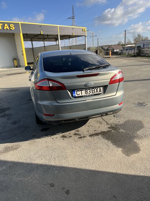 Vand   Ford Mondeo( sau fac schimb cu masina automata)