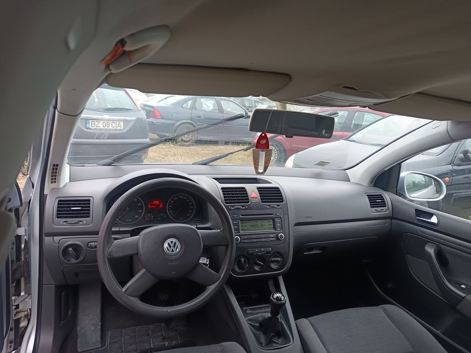 Golf 5 .2500 e .ușor negociabil