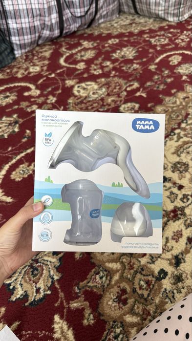 Ручной молокоотсос