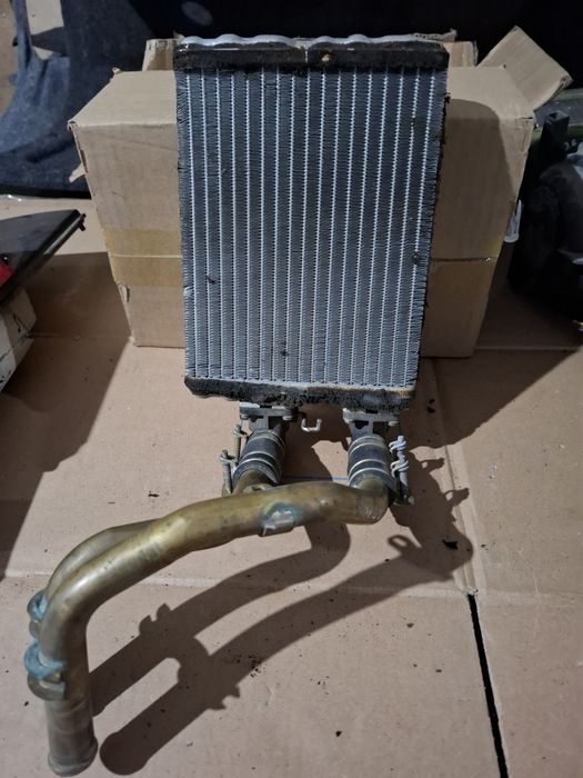 Радиатор печки Форд Маверик