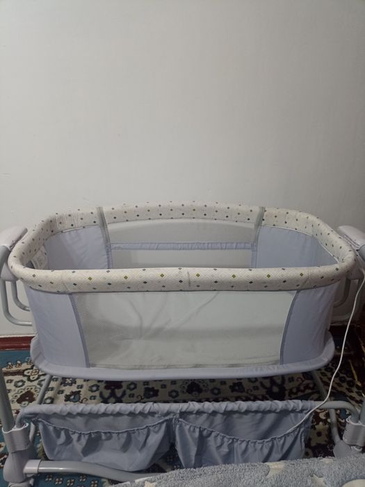 Электрическая люлька-качалка