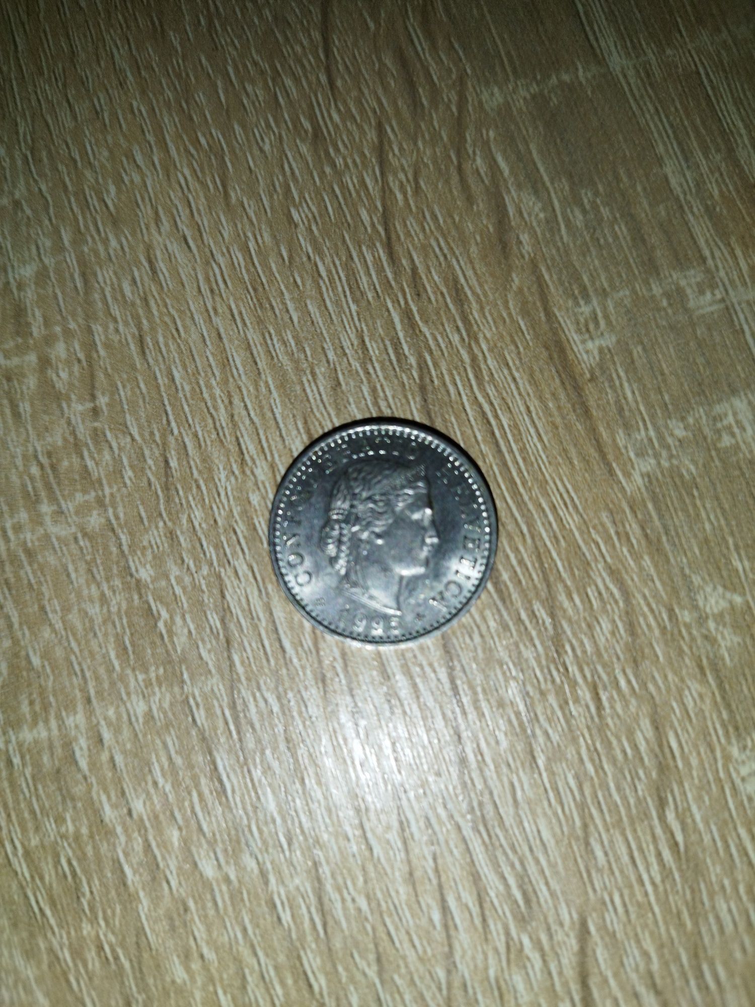 Vind moneda veche din imagine