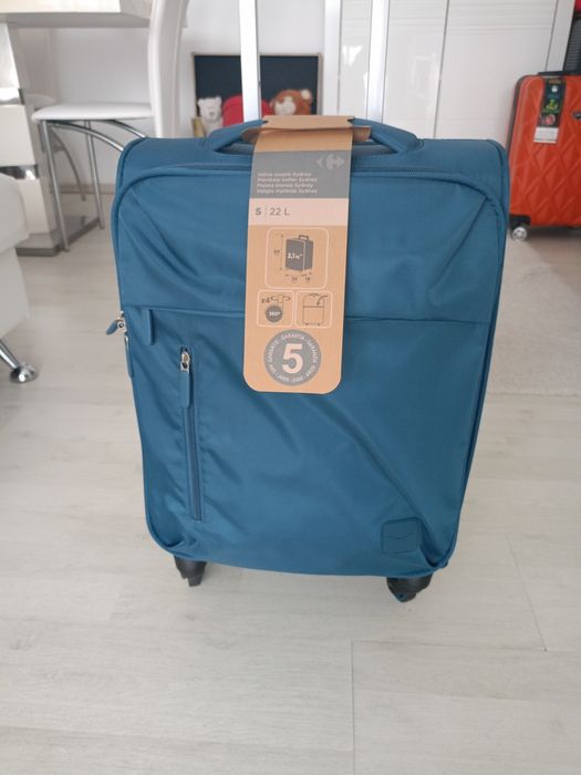Vând troler material textil dimensiune de 54 cm nou nouț, produs de ca