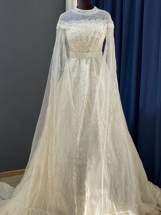 Yangu va kiyilgan kelin koʻylaklar