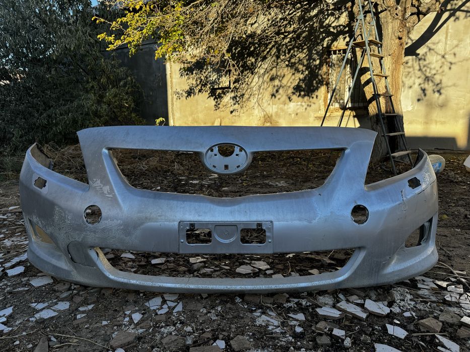Бампер переднии Toyota Corolla е150 (оригинал)