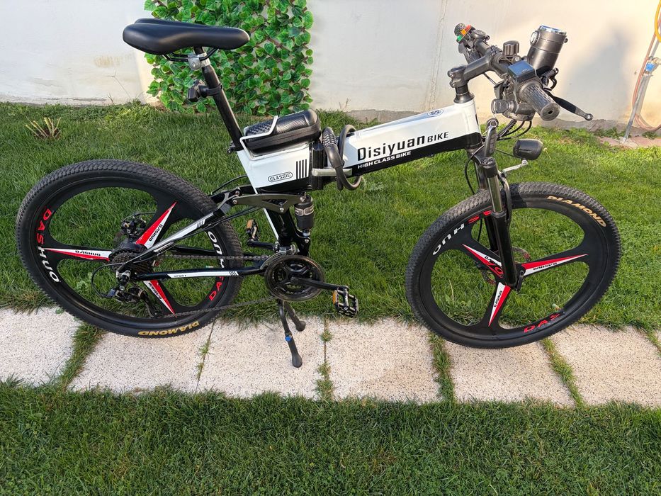 Vand bicicleta electrica, pliabila, perfecta stare.