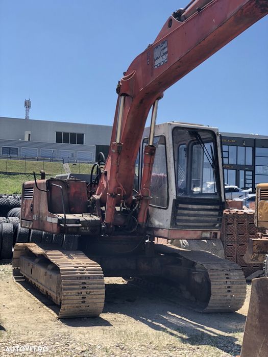 dezmembrez excavator pe senile liebherr r902