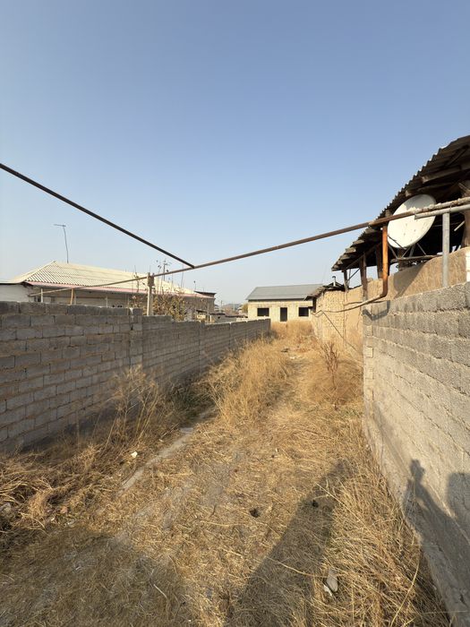 Sergeli Chortoq Maxallada yer sotiladi 4 xonali uyi bor karopka