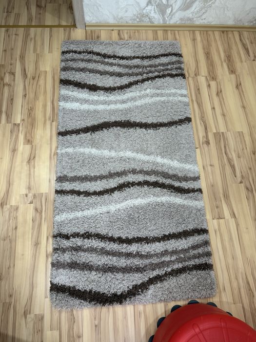 Небольшой ковер светло коричневый