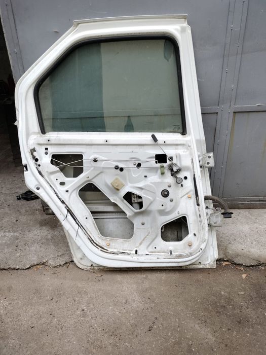 Usa stanga spate Dacia Logan