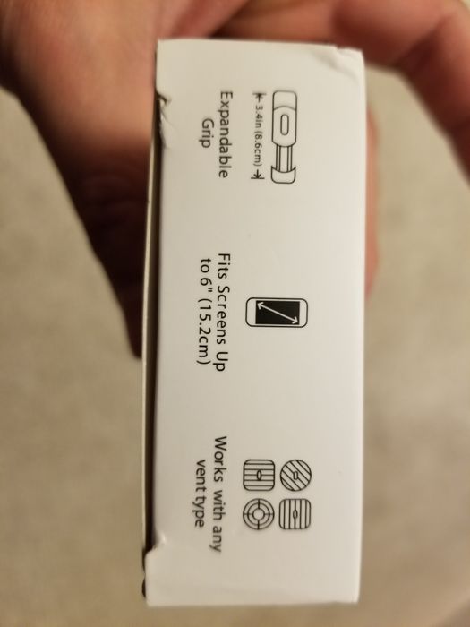 Suport universal telefon_prindere pe grila de ventilatie a masinii