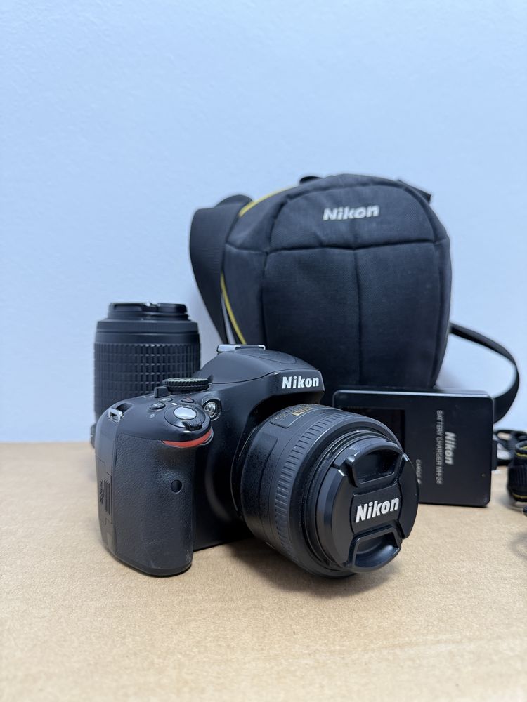 Nikon D5100 + 2 obiective (35mm & 55-200mm) + accesorii – kit complet