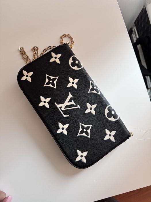 Geanta de umar Louis Vuitton