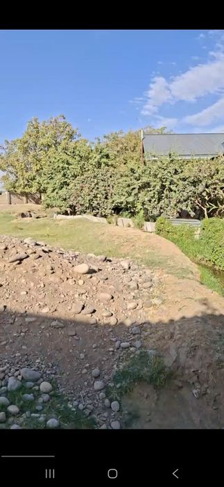 Продается земля 20 соток Тузел.Задняя сторона Олимпийского городка