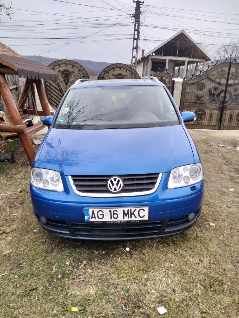 Volkswagen Touran sau schimb cu ATV