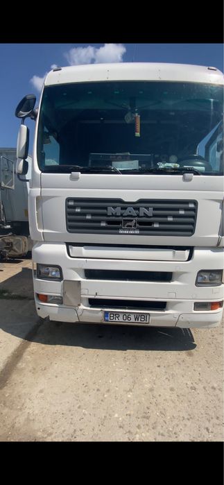 Man E5  TGA 2007/schimb cu miniexcavator