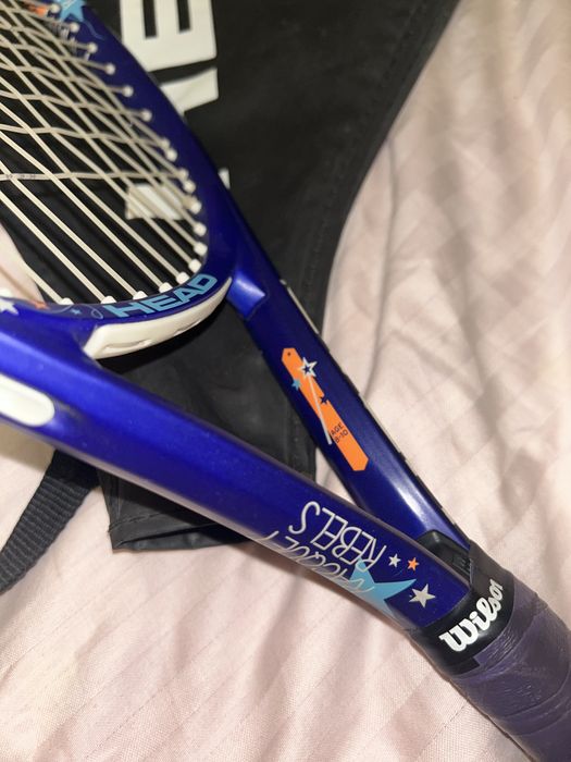 Теннисная ракетка