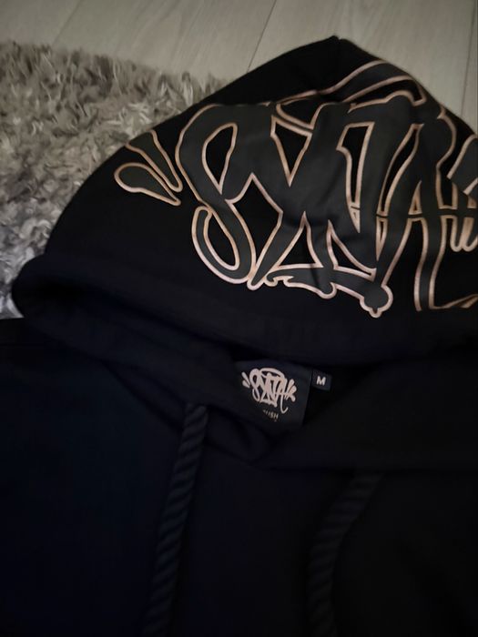 Худита syna world