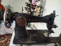 Masina de cusut Singer