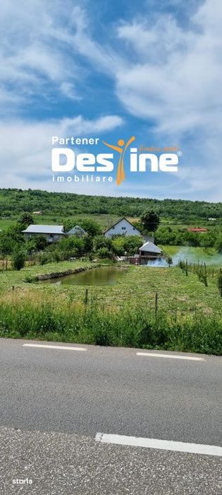 Casa 170 mp D+P+M cu 2400 mp teren la asfalt, IAZ in curte, loc. Osoi