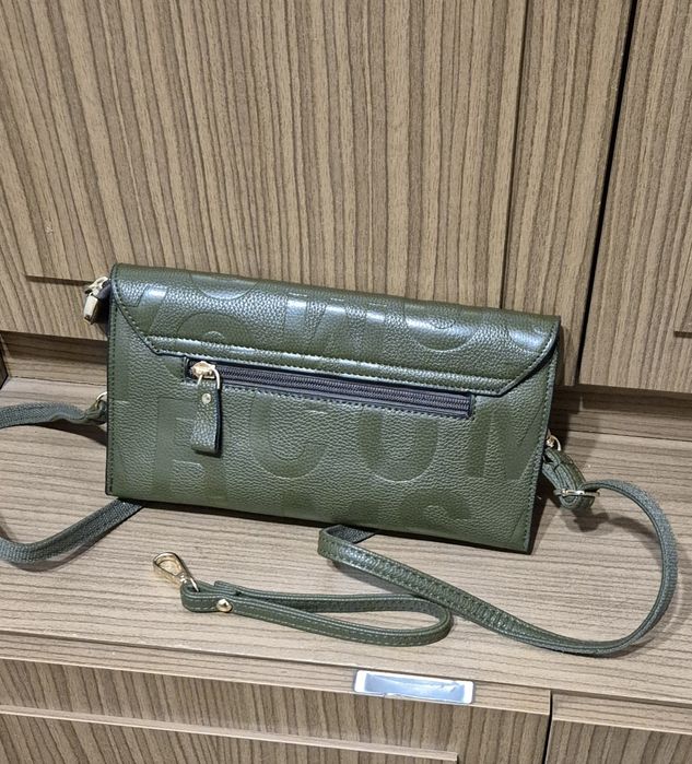 Стильная кожанная  женская сумка клатч.