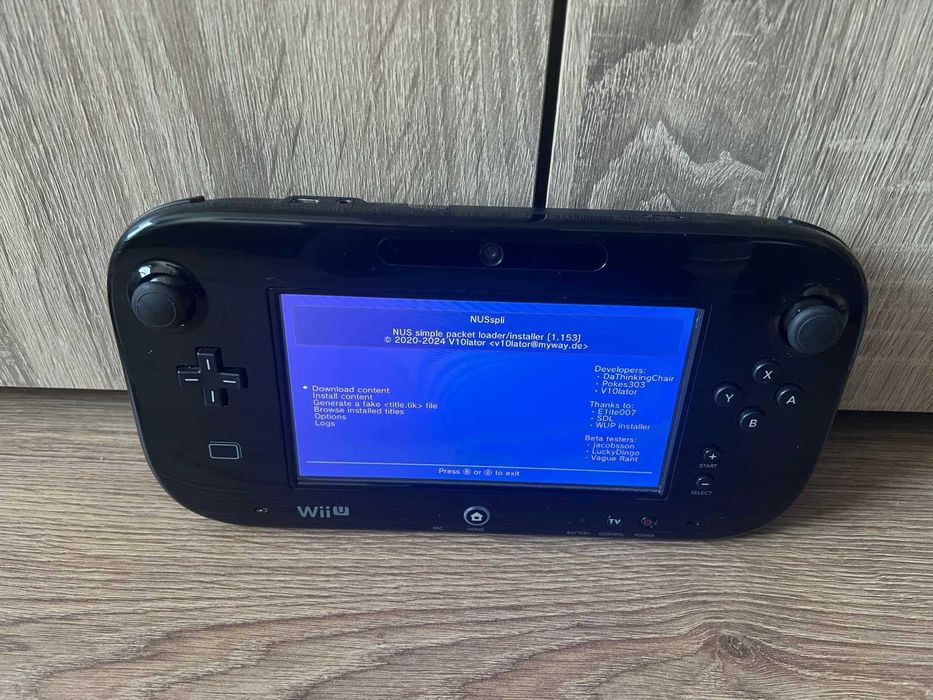 Consola Nintendo WII U modata cu jocuri si aplicatie descarcat jocuri