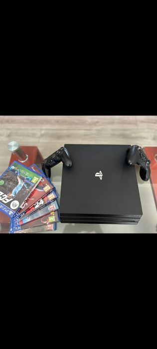 PS4 PRO cu jocuri incluse • Stare excelentă • Ideal de Crăciun