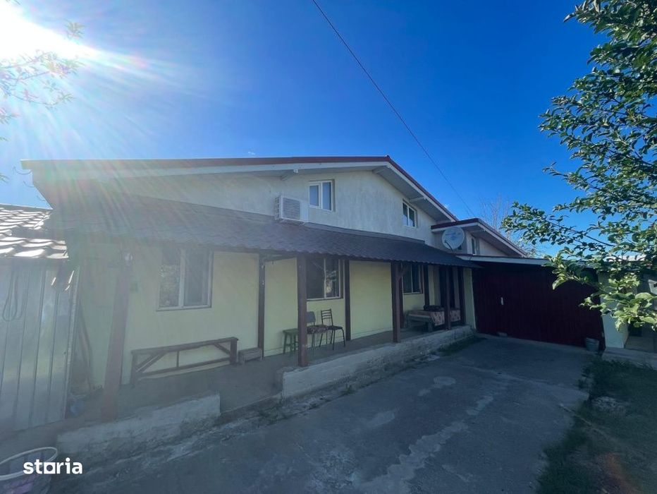 Casa parter cu garaj construita in 2011, cu teren de 511mp in Mogosest