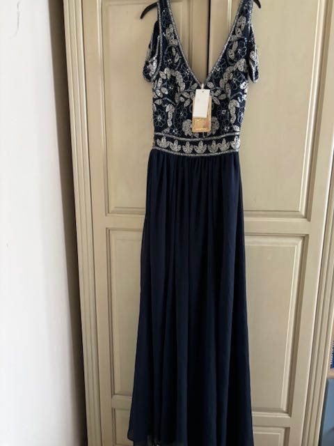 Нова маркова рокя Lipsy London размер С