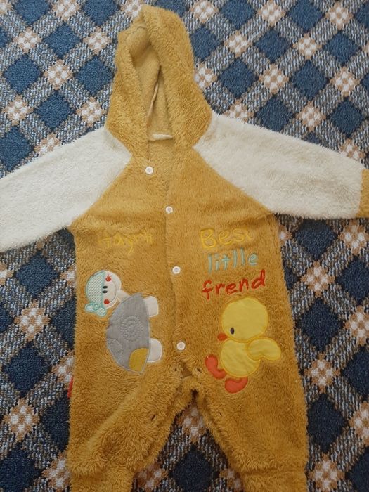 Бахорги детский комбинезон сотилади холати янги  сифатига гап йук .зур