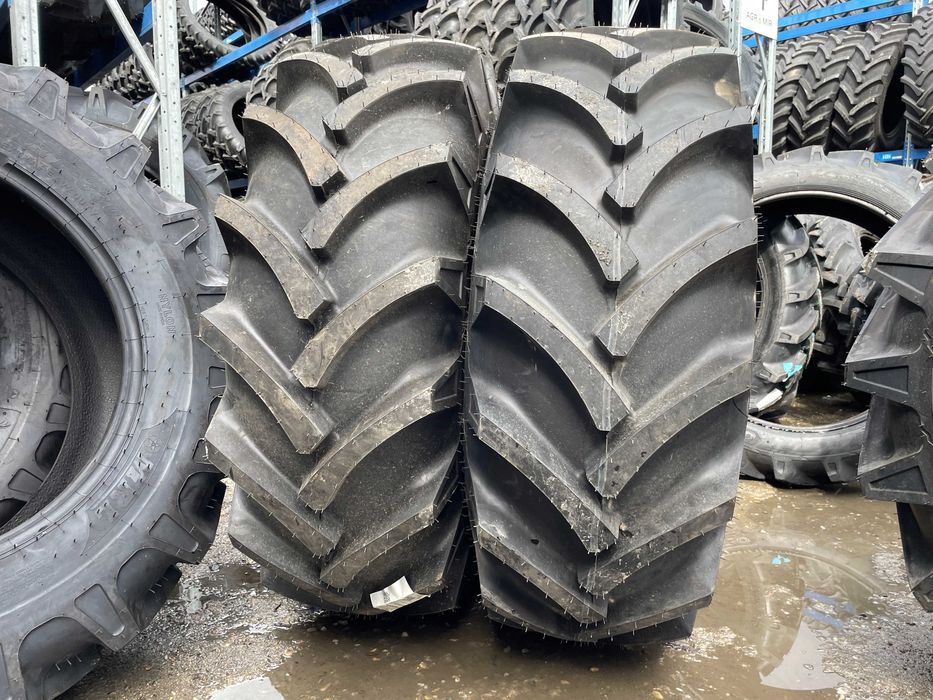Anvelope noi 16.9-24 cu 14 pliuri marca OZKA pentru tractor fata