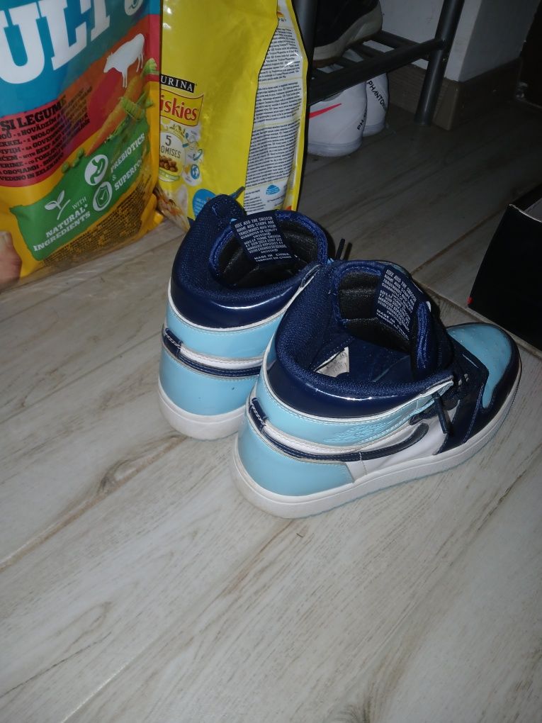 jordan 1 mid patent unc