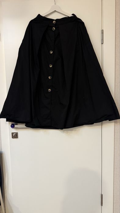 Юбки длины миди теплые