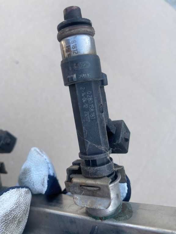 Rampa injectoare Opel Corsa D 1.2 benzina A12XER cod 0280151239
