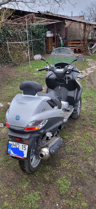 Piaggio mp3 400ie LT an 2010, se conduce cu categoria B