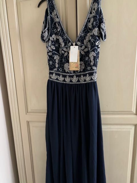 Нова маркова рокя Lipsy London размер С