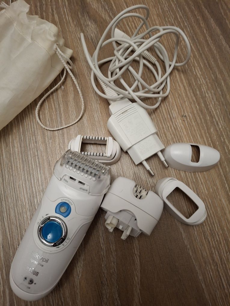 Скрабер аппарат для чистки лица и эпилятор Braun.