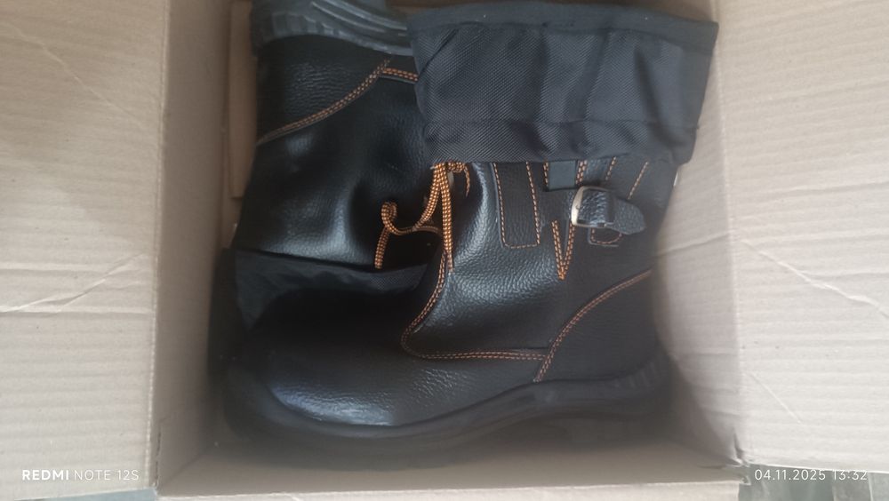 Продам новые сапоги