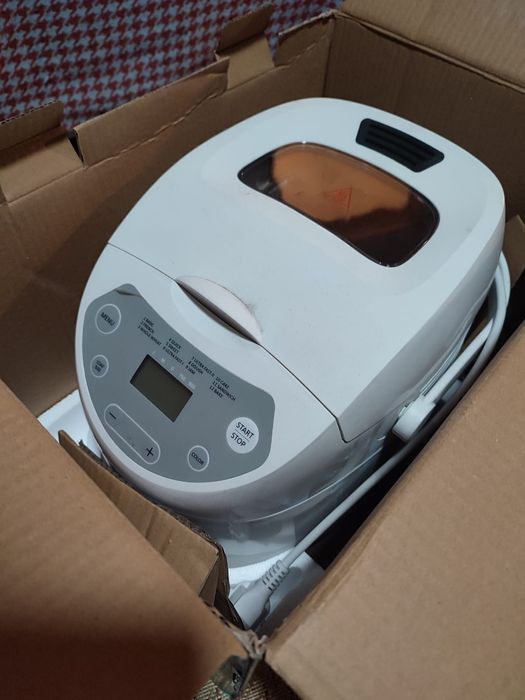 Хлебопечь новая ,в упаковке