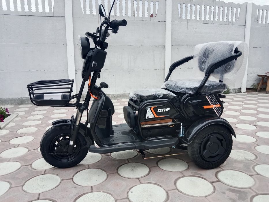 Электрический трицикл новый