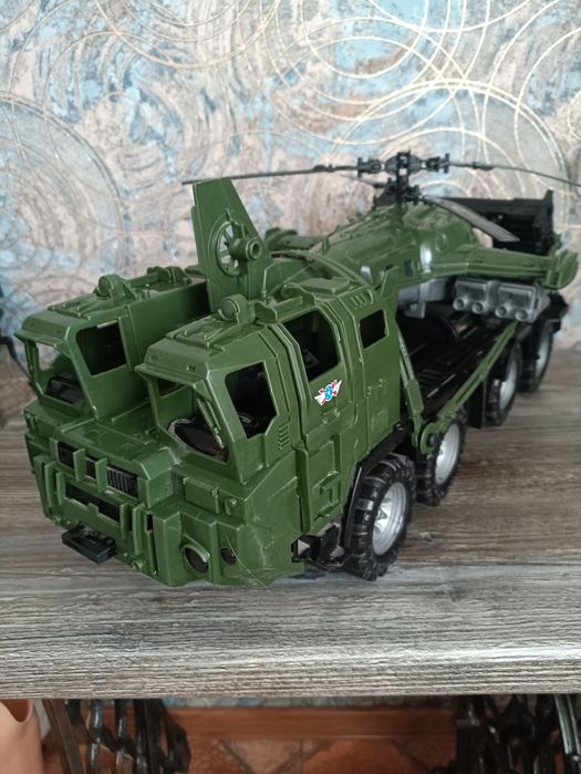 продам автоигрушки,тягач,вертолет
